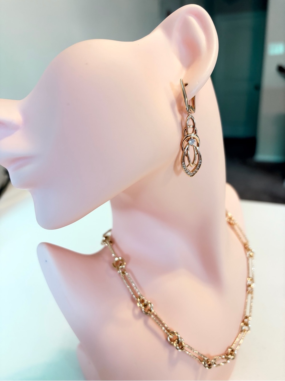 Rose Gold Long Drop Earrings With Clear Stones.